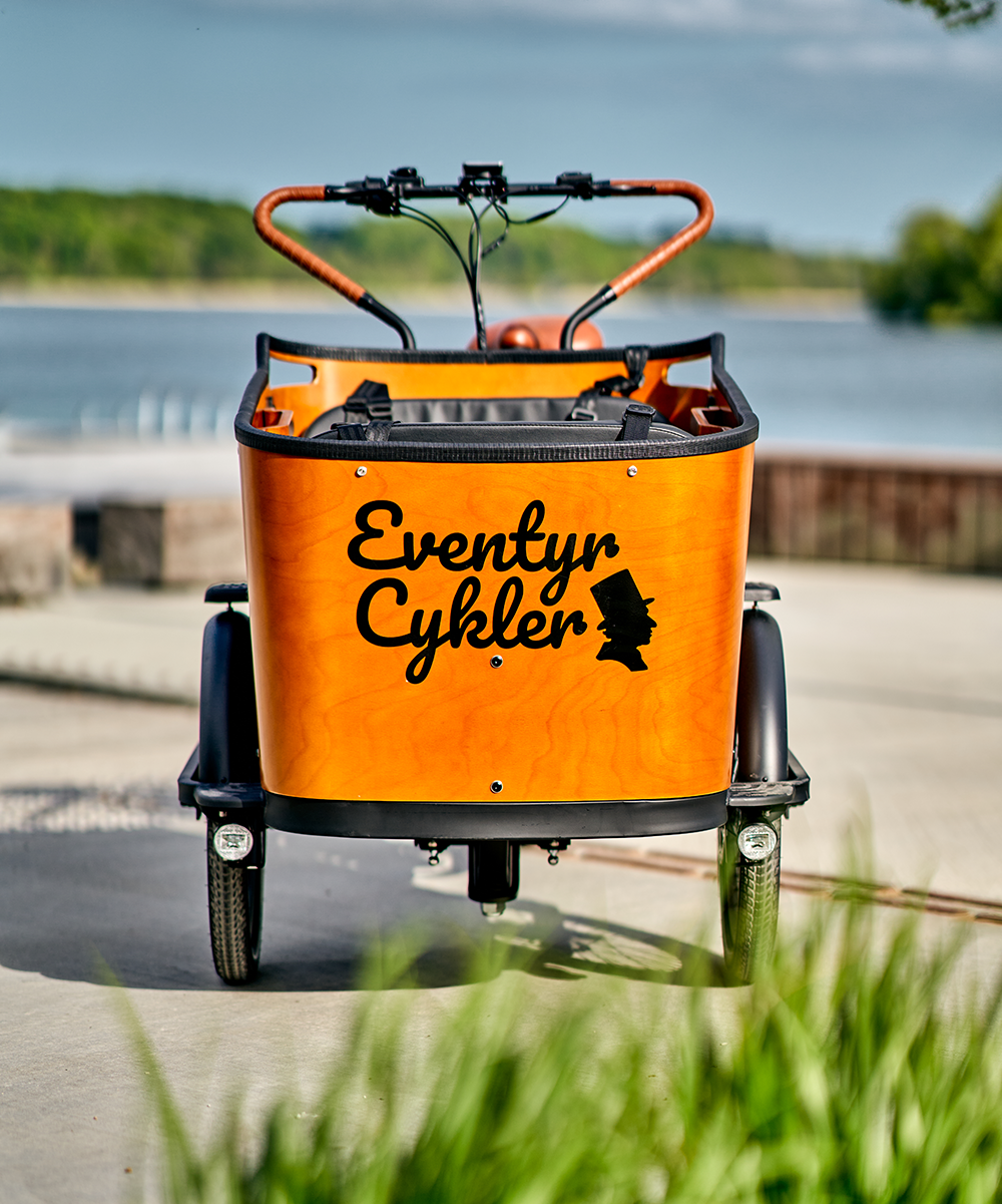 Orange EventyrCykler el-ladcykel set forfra, klar til en tur